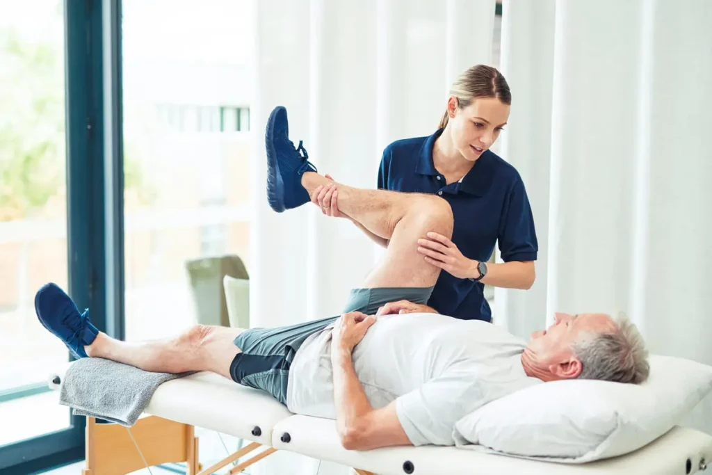Revitalising Recovery: Effective Rehabilitation Strategies for Muscle Injuries 3 Physiotherapist assisting a patient with muscle recovery exercises Southall