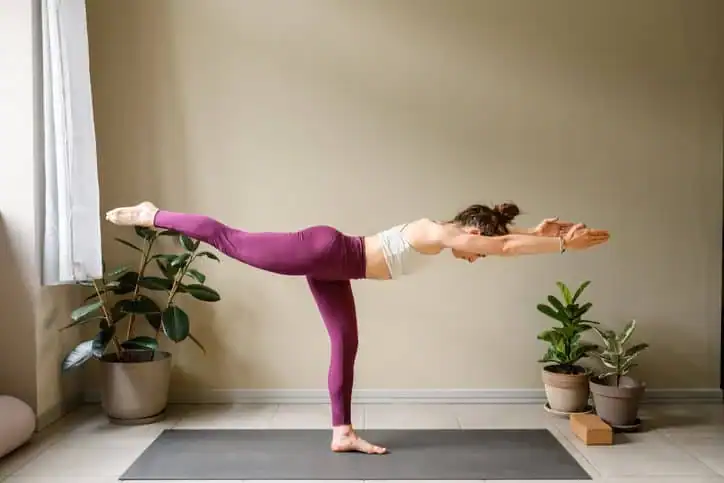 Achieving the Perfect Tone: How Often Should You Exercise for Results? 1 Woman doing Yoga exercise Southall to help with toning the body.