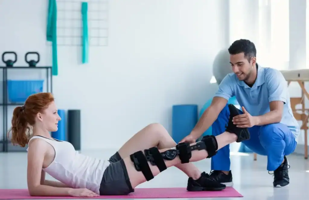 Debunking Meal Timing Myths: The Truth About Muscle Recovery 1 Woman having treatment to help muscle recovery Southall after an injury
